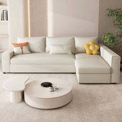 Smooth fabric upholstery in beige tone – sofa come bed style, boxy arm layout