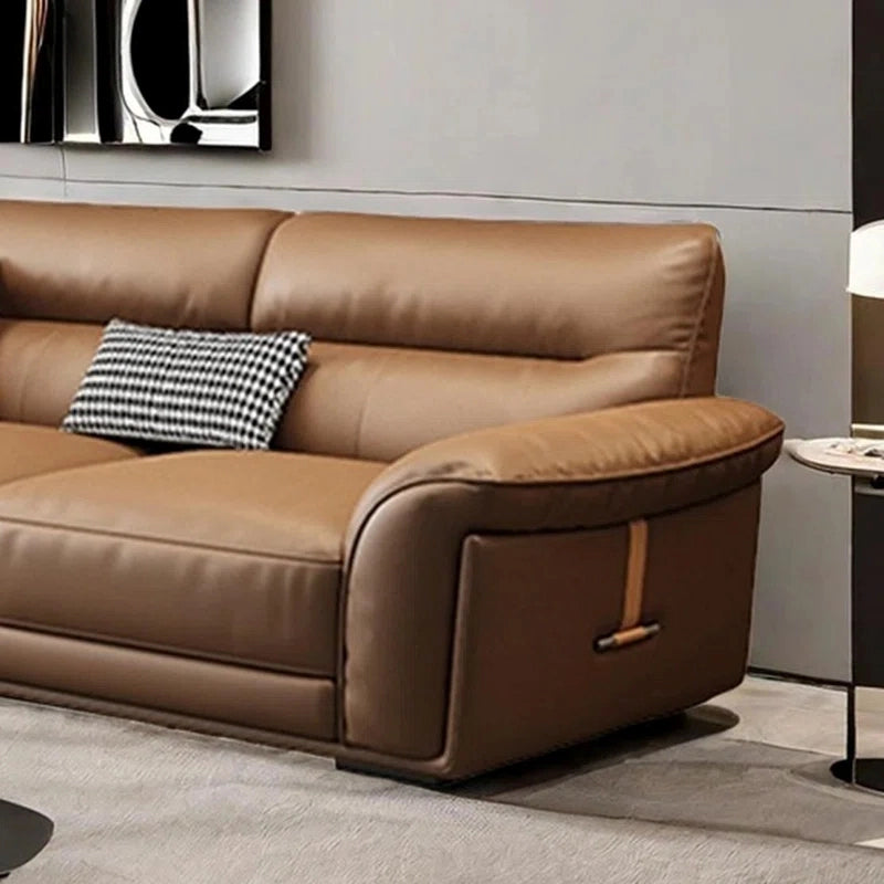 Showcasing a sleek modern sofa design, this premium taupe leather couch features curved pillow-top arms, plush seat cushions, and a minimalistic silhouette ideal for contemporary and stylish homes. 
