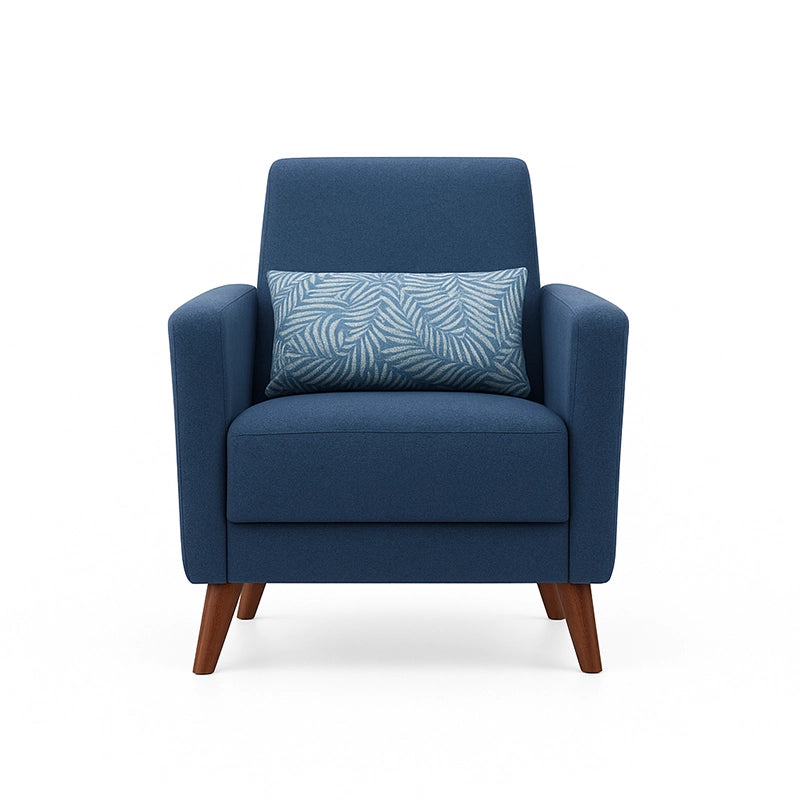 Blue armchair with a patterned pillow on a white background