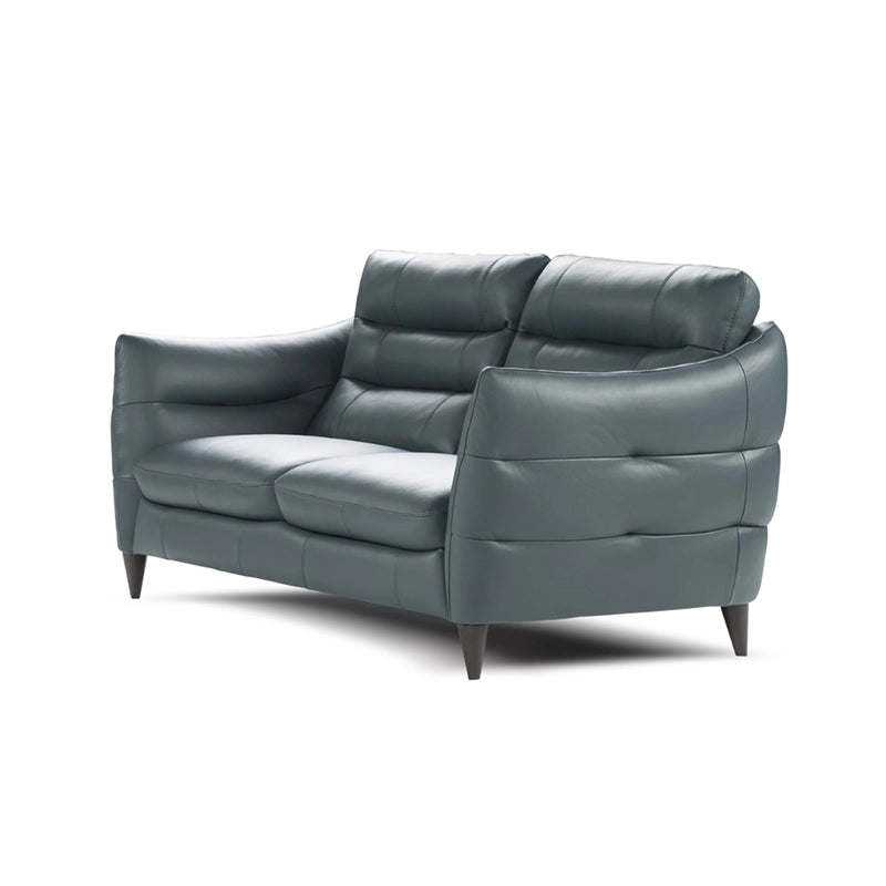 Upholstered in matte-finish pure leather available in deep teal and ivory, it suits upscale interiors looking for understated sophistication. 