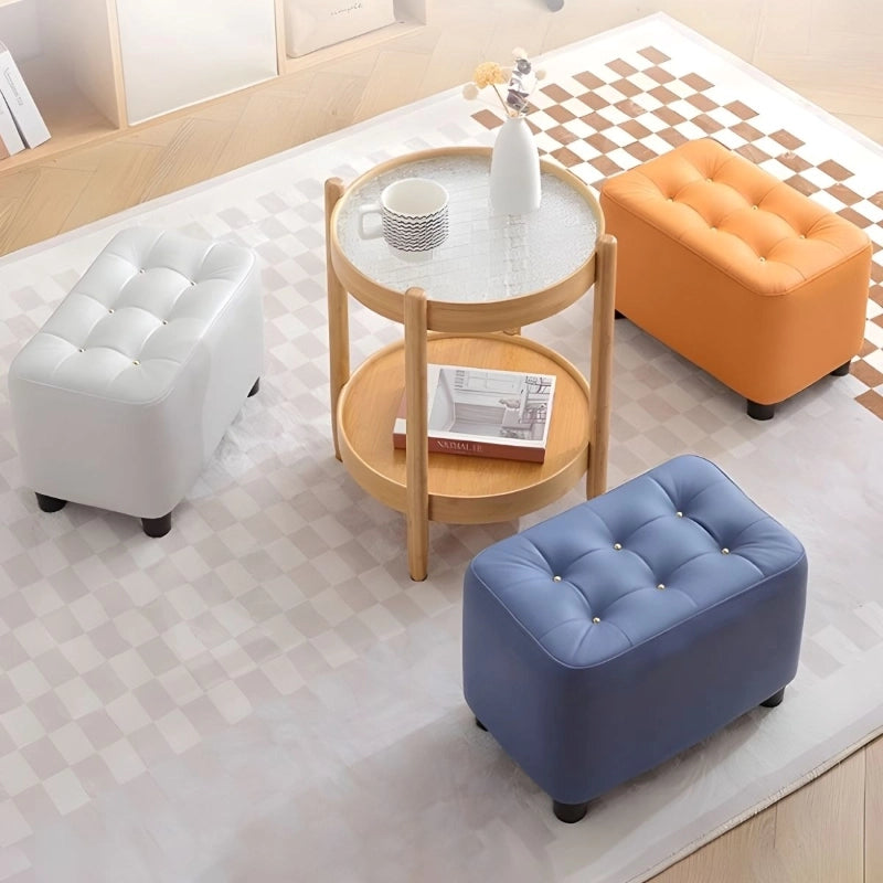Add a splash of colour and multifunctional charm to your space with this compact ottoman stool, ideal as a footrest, footstool, or extra seating. 