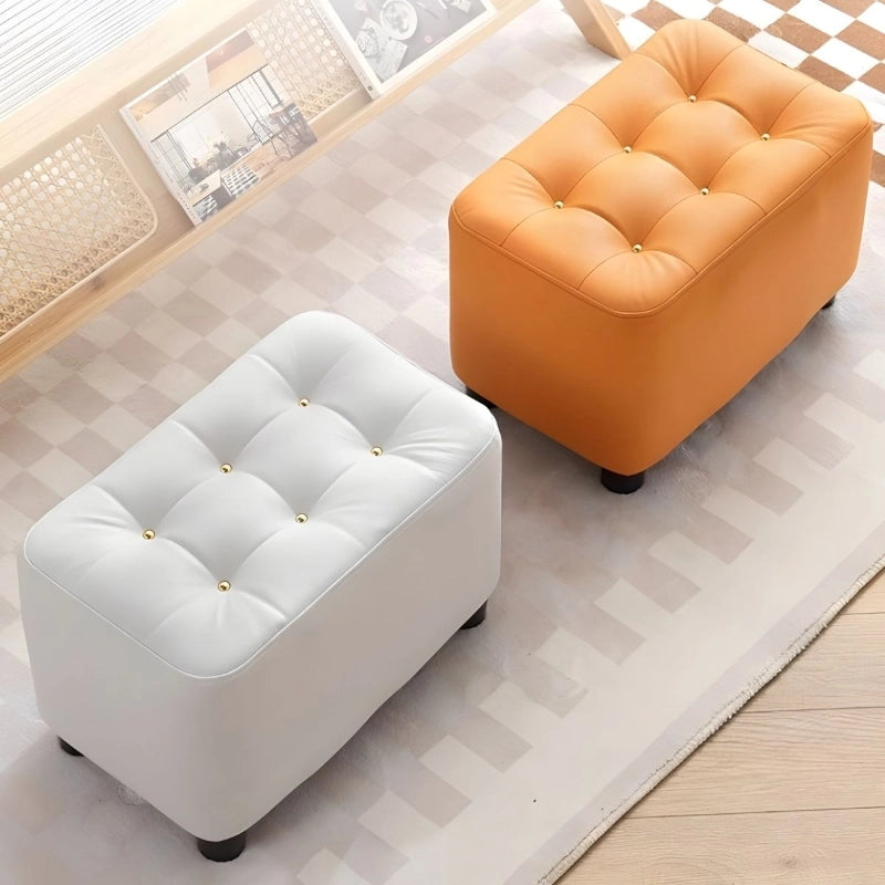 Upholstered in soft faux leather with a stylish tufted top, this pouf ottoman comes in vibrant and neutral shades to match every interior style. 