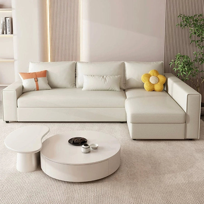 Smooth fabric upholstery in beige tone – sofa come bed style, boxy arm layout