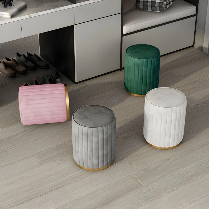 This compact cylindrical pouffe blends stylish ottoman seating with practical comfort.