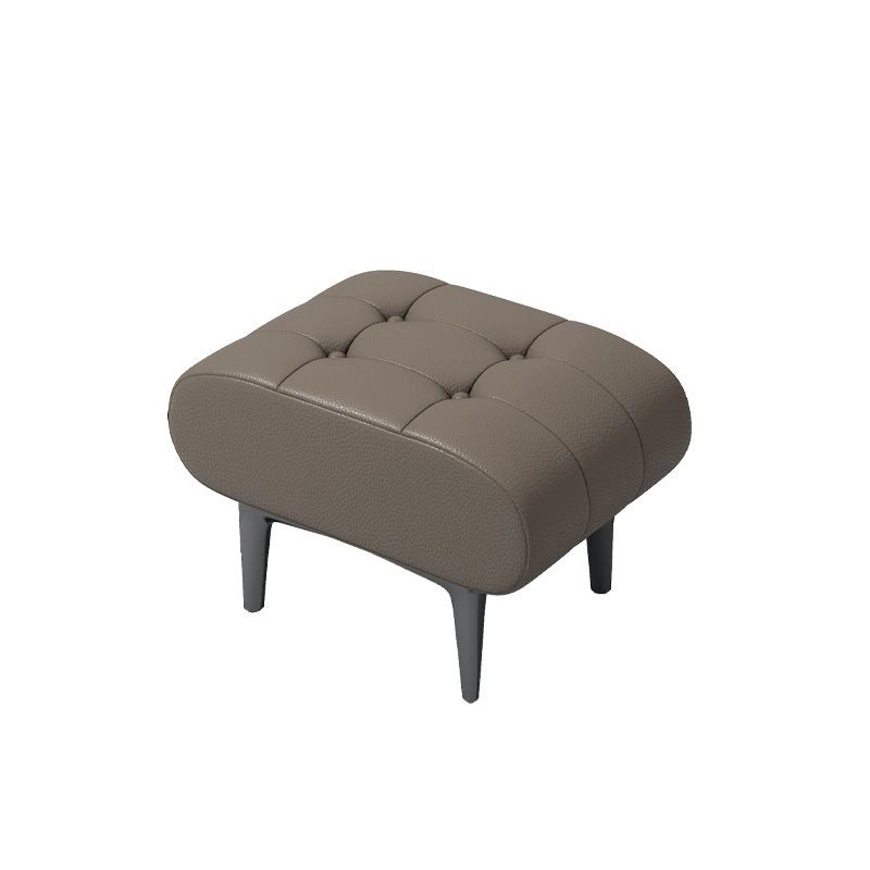Shaped as a low rectangular unit with rounded edges, it’s crafted with dense foam and set on minimalist black legs—making it as stylish as it is practical.
