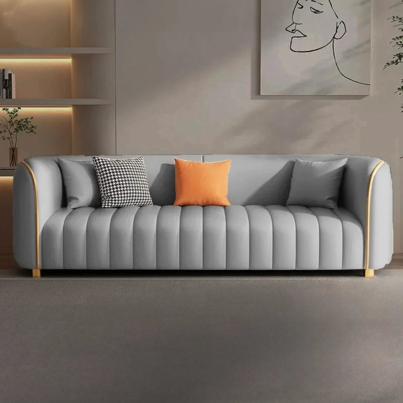 Channel tufting enhances its contemporary sofa design, while firm high-density foam offers supportive comfort.