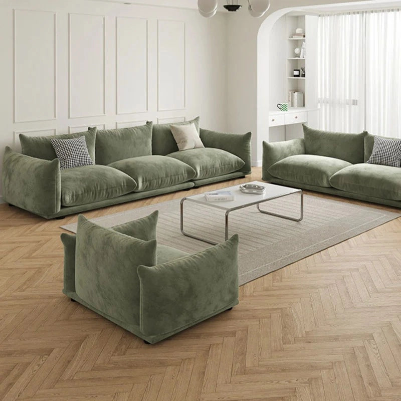 Crafted from durable neem wood and layered with a spring-foam base, it supports both casual lounging and formal hosting.