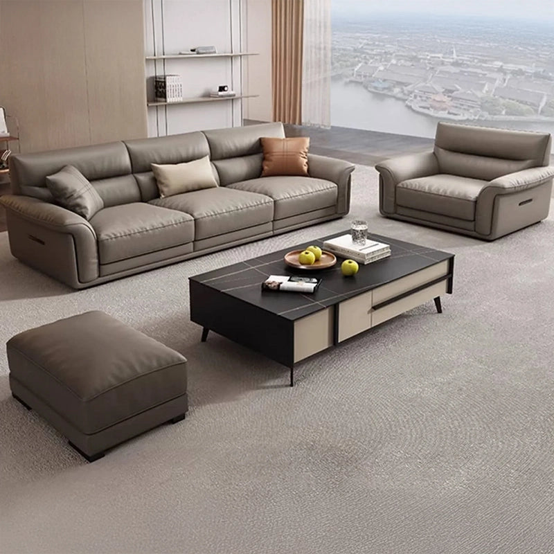 The soft-rounded silhouette, minimalist low-rise legs, and box-style cushions define its modern sofa design.