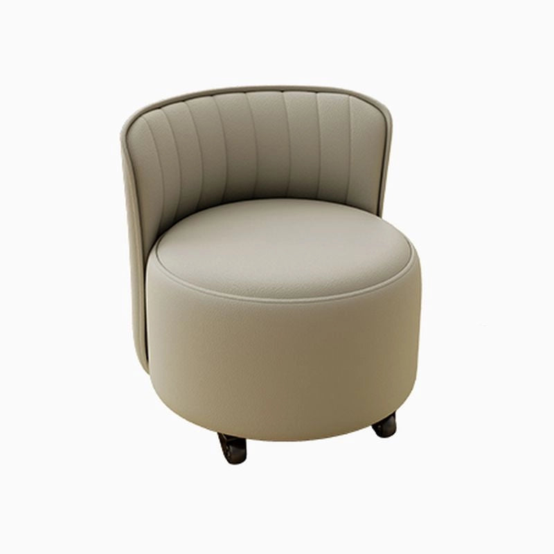  Featuring a round shape and softly contoured backrest, it doubles as a casual pouf chair and mobile footstool.